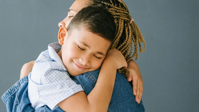 Hugging mother and child